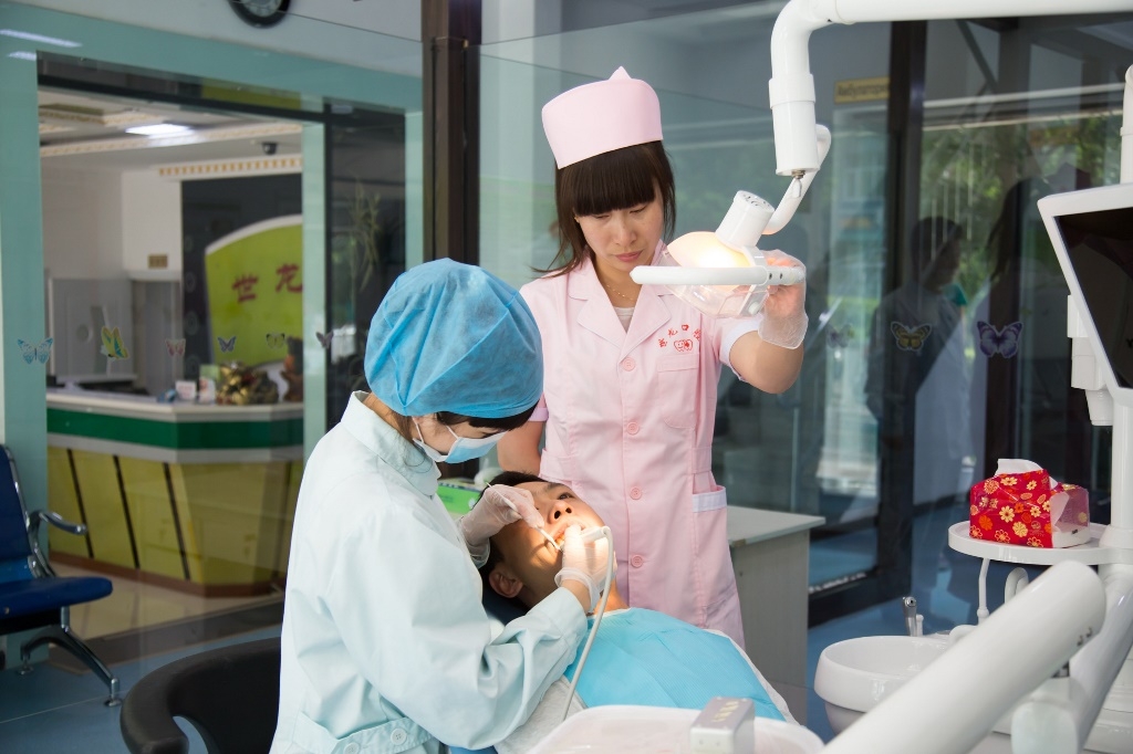 Лечение зубов в клинике хэйхэ, китай